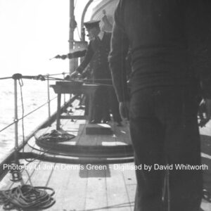 Officers having target practice with their revolvers onboard unknown ship. Lt John Dennis Greene026